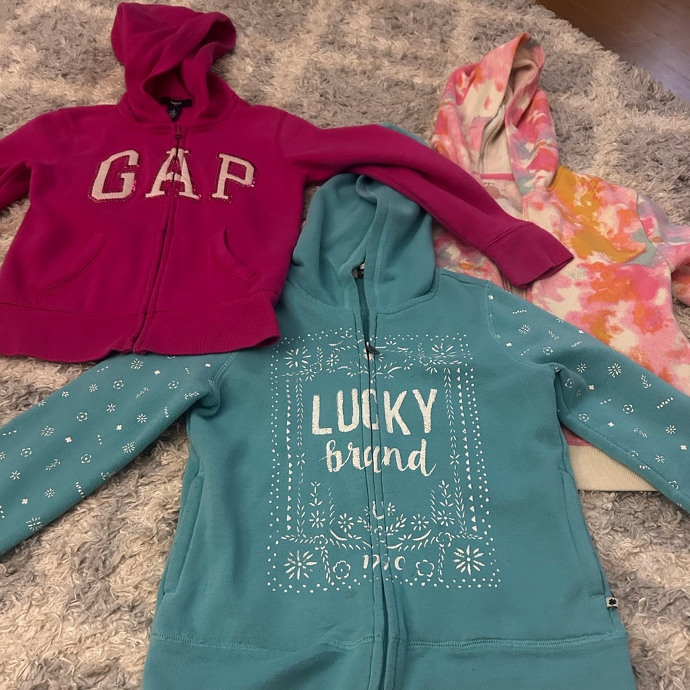 Three girls hoodies in size medium